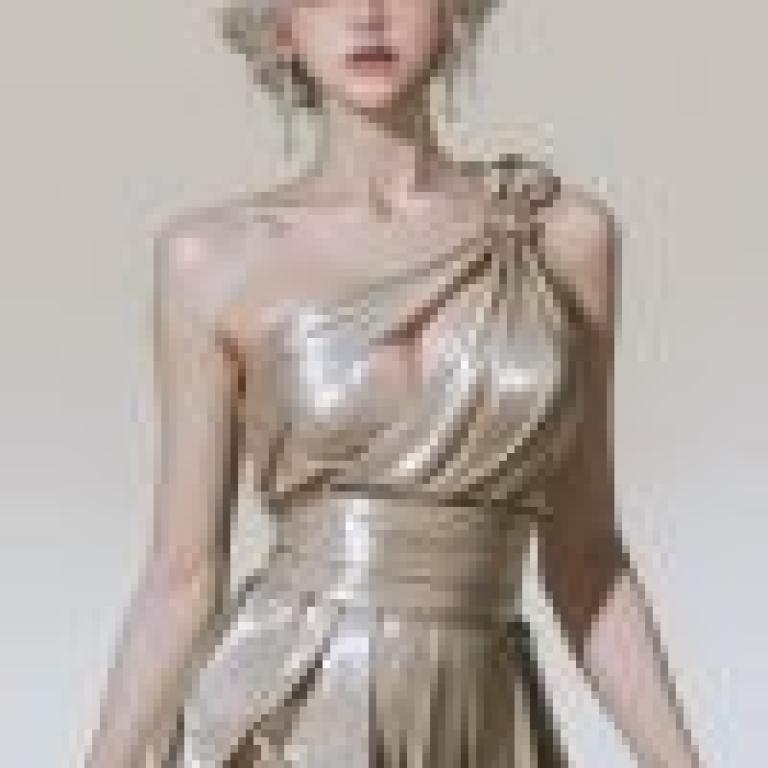 gorgeous，Model with short hair and silver earrings.