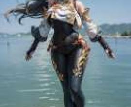 Chelsea Kwoka，Woman wearing black leggings and gold boots.