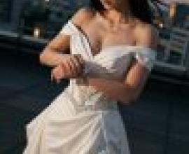 Dance of the Night，Woman in white gown and glasses.