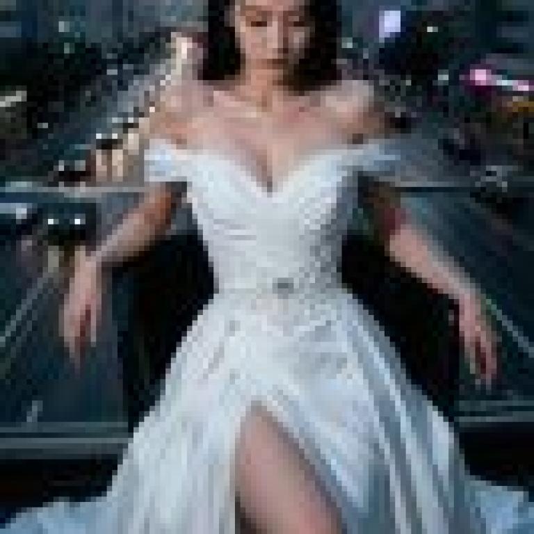 Dance of the Night，A woman wearing a white dress standing in front of a city street.