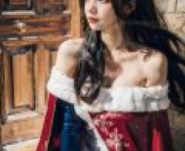 Snowflakes in the Icy Illusion，A girl sitting down with a santa hat and looking at the camera.