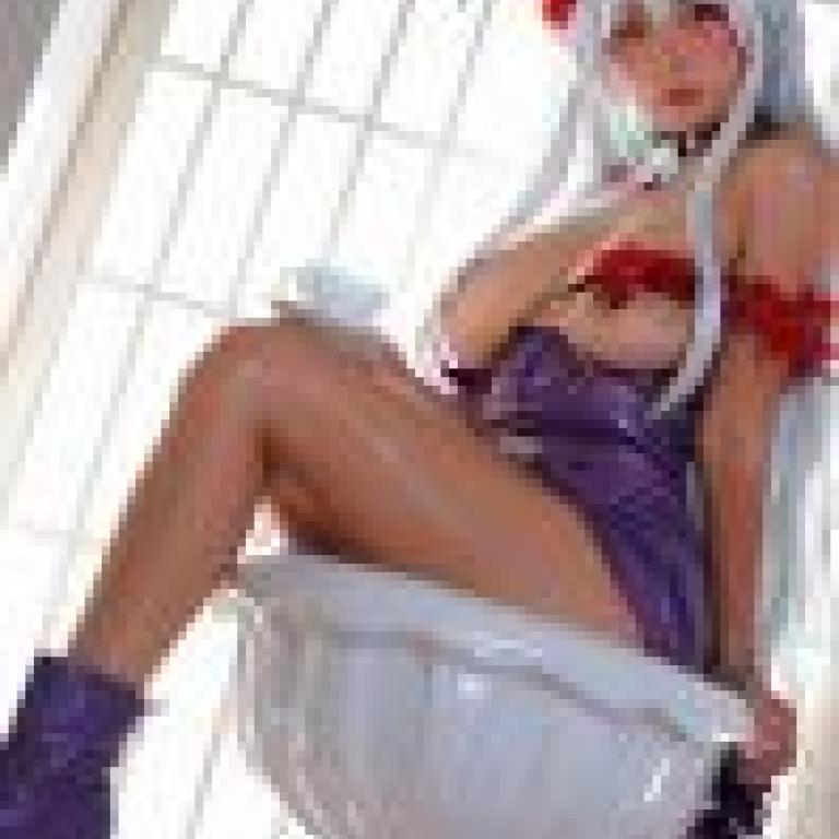 Beautiful and fashionable，A doll sits on a pedestal outside.