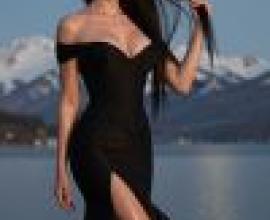 girls，Woman in a black dress stands on the shore