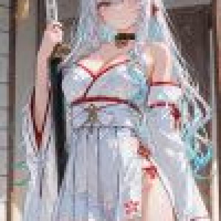 Battle Witch，A woman with blue hair， white dress and red trim.