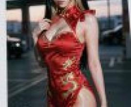 girls，A woman in red Chinese clothing is posing outdoors.