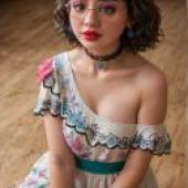 Mirabelle Marig， Encanto，A girl wearing glasses and a white dress with blue trim.