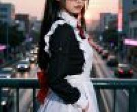 Uniform Road，A girl wearing glasses and red headband standing on bridge.