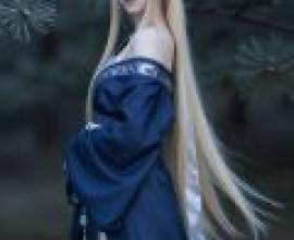 Phantom in the Mountains，A girl in a blue dress with a long blonde ponytail.