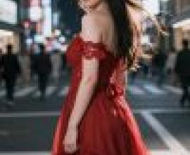 girls，A woman in red dress and glasses on street.