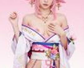 Pink Power，A girl in pink and white dress holding her necklace.