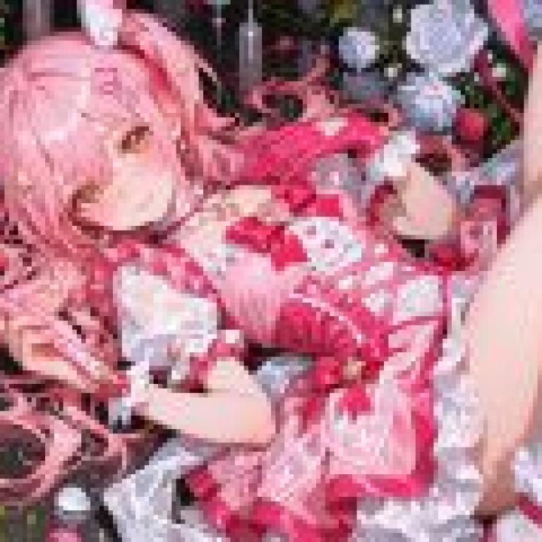 Magical Girl Flower，A cartoon girl holding something in her hand with hearts around her.