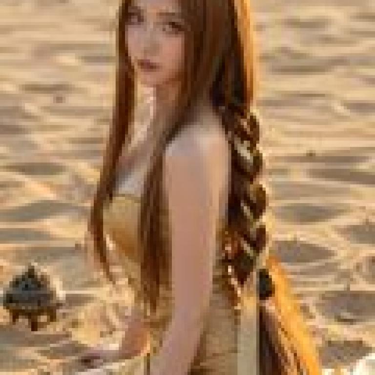 z image test，A model is wearing gold and looking into the camera.