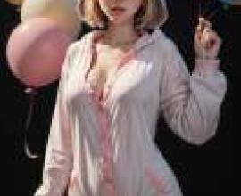 White Rabbit in a Dream，A model girl is wearing a pink pajama set 