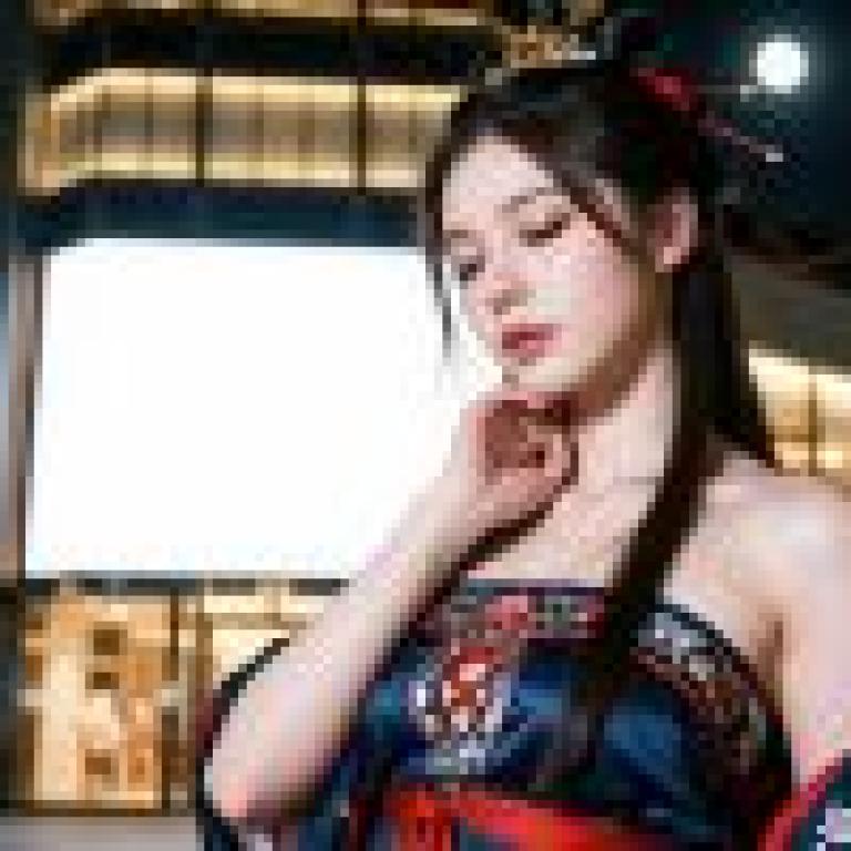 Beautiful photographer，Asian woman in red and black dress at night.