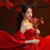Red Dream，A beautiful woman in red dress holding flowers.