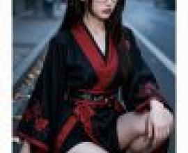 Red Temptation，A girl in red and black sitting on the ground.
