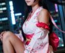 dress up，A woman dressed in a pink kimono.