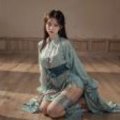 Aesthetic woodland: Blue skirt women sitting in the room， wooden floor lighting， Du Jions elegant， aesthetic style.
