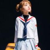 Nelvana of the series，Sakura Avalon，A young girl on a stool.