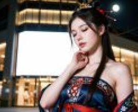 Beautiful photographer，Asian woman in red and black dress at night.