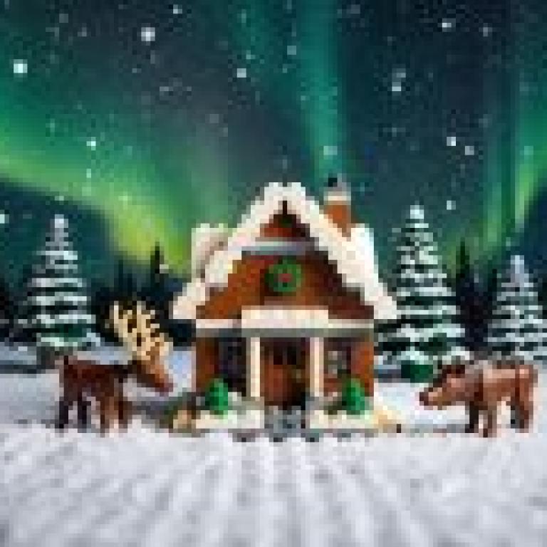 LEGO style Christmas，A lego set featuring reindeer and the house is from christmas time.