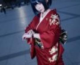 The Phantom of the Red Kimono，Asian woman in red kimono standing outdoors with phone on left wrist.