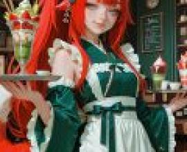 TA，A girl in red hair and green dress.