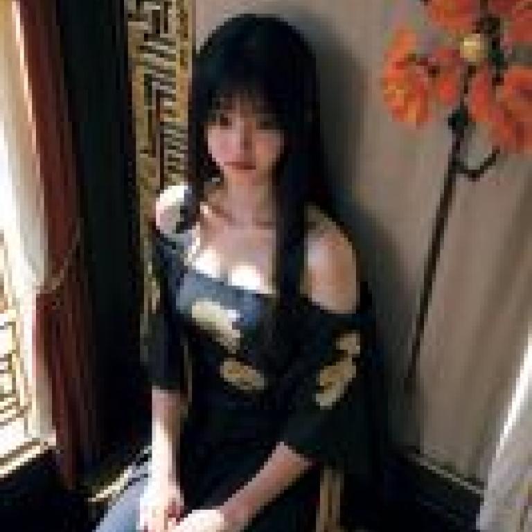 KyokofukadaGirl in dress sits on bench.