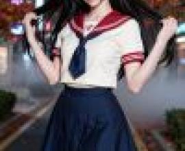 Beautiful photographer，Girl with black hair wearing red and white sailor s outfit.