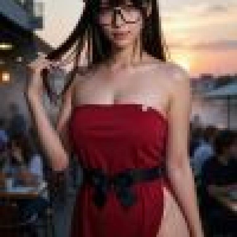 Red Wind，Model with glasses and red dress in front of people.