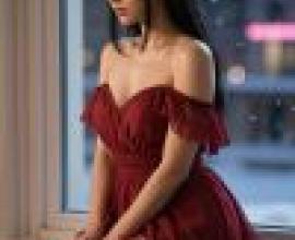 Red Temptation，A girl sits in a window wearing a red dress.