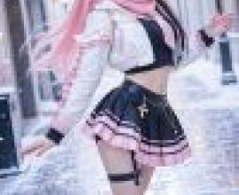 Magic Memories，A girl standing wearing pink， white and black clothing.
