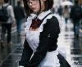 Street beauties，Girl is wearing glasses and red bow in her hair.