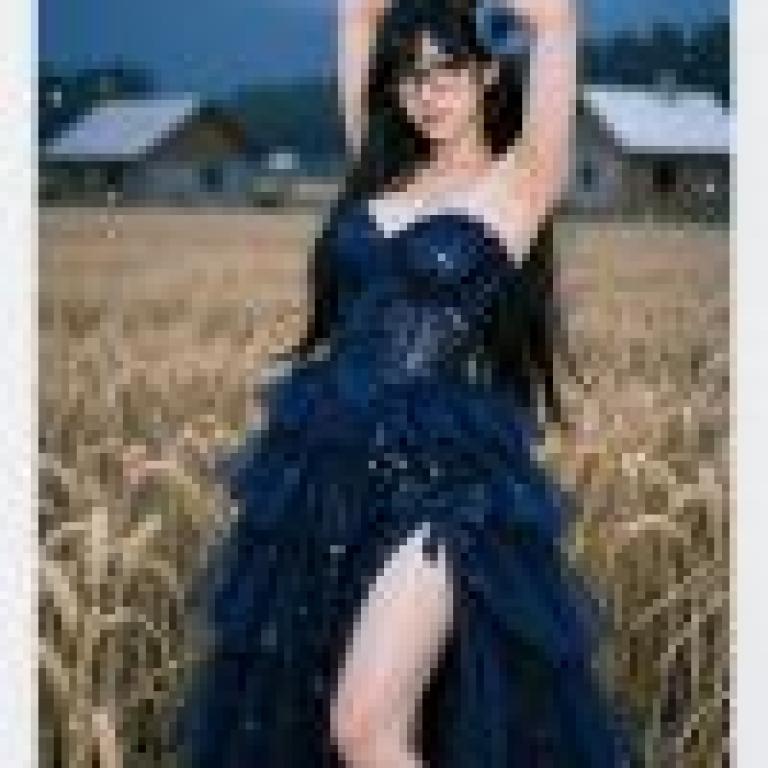 girls，A woman in blue dress and glasses.