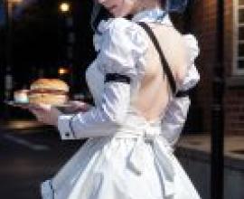 FloatingPlanet Celestial Septagram PlanetWaitress wearing a white dress.