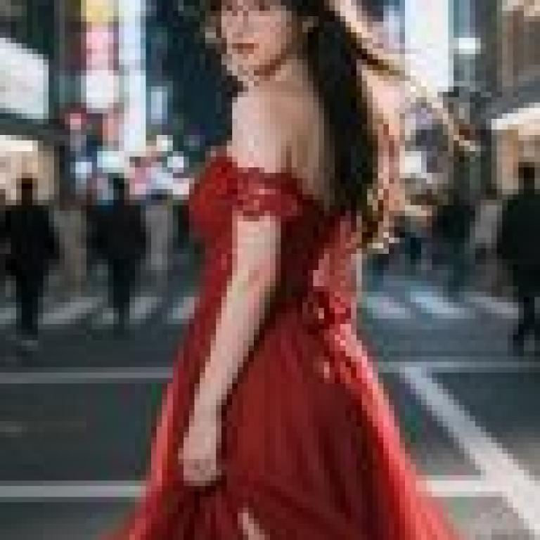 girls，A woman in red dress and glasses on street.