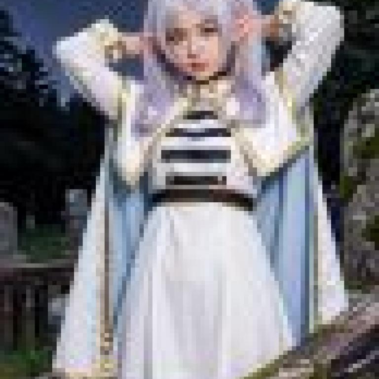 Frieren，A young girl with a blue cape.