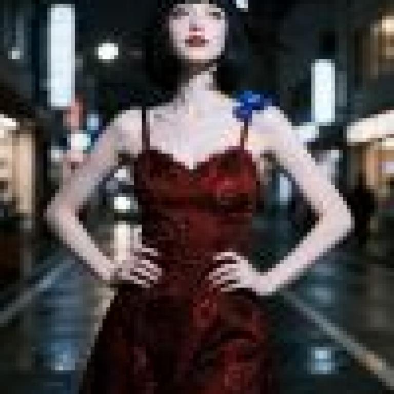 Red Temptation，Woman in red dress with bow on her hair.