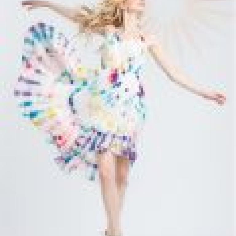 ZIT ATR，A blonde girl wearing a tie die dress.