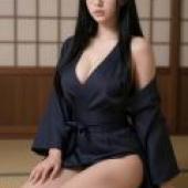 The Japanese Phantom of an Old House，A woman with black hair and glasses sitting down in a kimono.