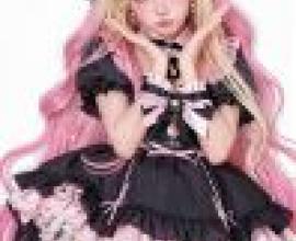 multicolor，A doll with pink hair and black bow dress.