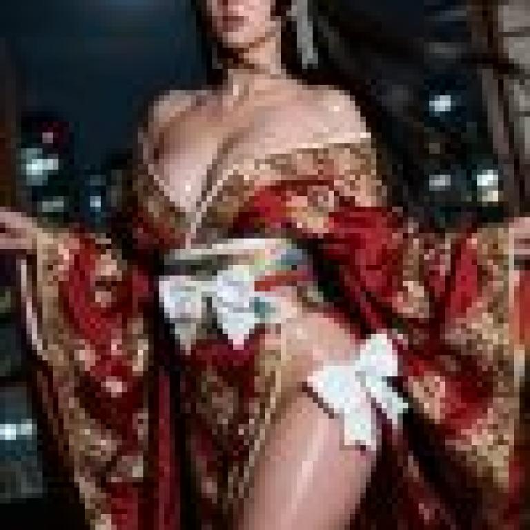 Kimono in the story，A girl with a red dress standing in front of a moonlit sky.