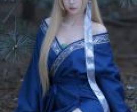 Phantom in the Mountains，A girl with blonde hair in front of a tree branch.