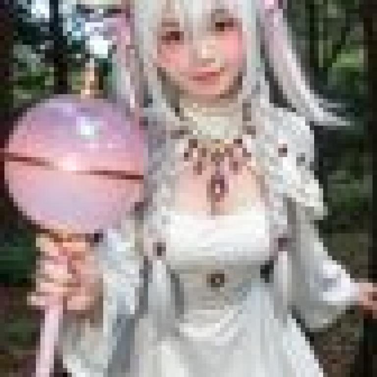 girls，A girl with fake antlers is holding a pink ball and looking at the camera.