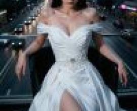 Dance of the Night，A woman wearing a white dress standing in front of a city street.