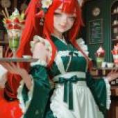 TA，A girl in red hair and green dress.