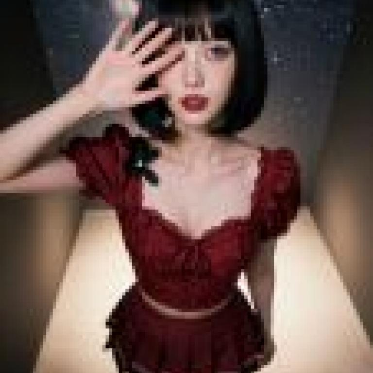 Magazine cover，Girl with black hair and red dress.