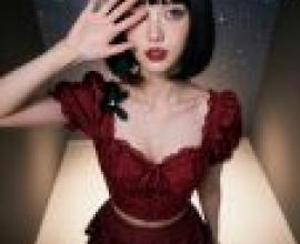 Magazine cover，Girl with black hair and red dress.