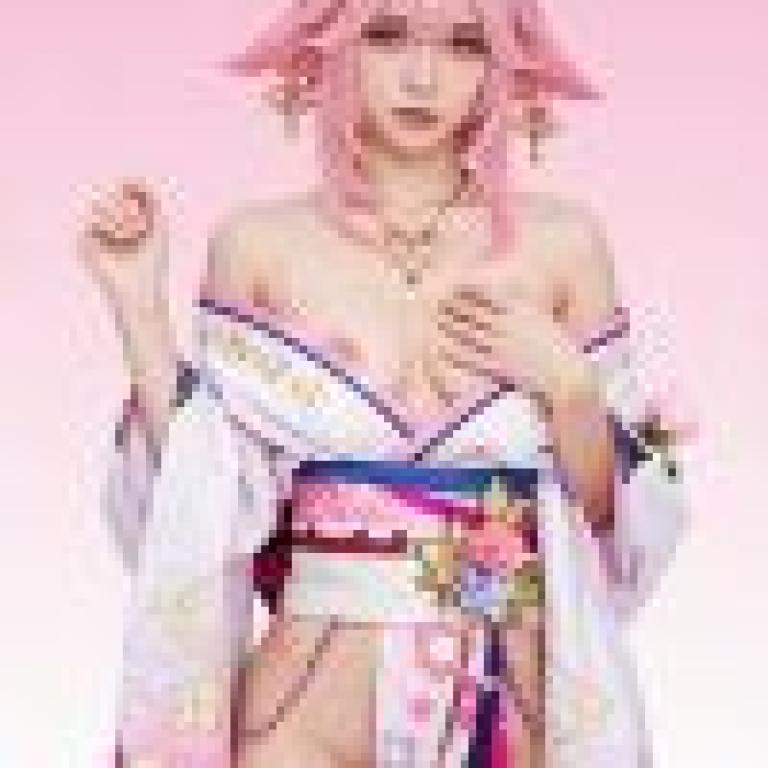 Pink Power，A girl in pink and white dress holding her necklace.